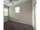 Spacious bedroom with two windows and neutral decor at 8502 Arcadia Ln, Davenport, FL 33896