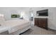 Bright bedroom with a king-size bed and a view at 14501 Grove Resort Ave # 3137, Winter Garden, FL 34787