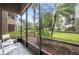 Relaxing screened-in patio overlooking a courtyard at 14501 Grove Resort Ave # 3137, Winter Garden, FL 34787