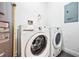 Convenient laundry room with a washer and dryer at 14501 Grove Resort Ave # 3329, Winter Garden, FL 34787