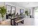 Bright dining area with a modern table and bench seating at 557 Zinfandel Dr, Holly Hill, FL 32117