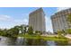 Two-story building with lakefront views and walkways at 13427 Blue Heron Beach Dr # 1004, Orlando, FL 32821