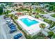Community pool with surrounding parking and landscaping at 5875 Talavera St, Orlando, FL 32807