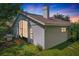 Rear view of house, showcasing a screened patio and grill area at 2431 Pewter Ct, Orlando, FL 32837