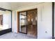 Screened lanai with sliding glass doors leading to backyard at 137 Birmingham Dr, Kissimmee, FL 34758