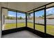 Spacious screened lanai overlooking a fenced backyard at 137 Birmingham Dr, Kissimmee, FL 34758
