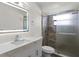 Modern bathroom with updated vanity, large mirror, and shower at 137 Birmingham Dr, Kissimmee, FL 34758