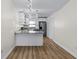 Modern kitchen with granite countertops and stainless steel appliances at 137 Birmingham Dr, Kissimmee, FL 34758