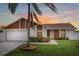 Updated 2 bed, 2 bath home with a landscaped lawn and attached garage at 137 Birmingham Dr, Kissimmee, FL 34758