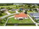 Aerial view of house and surrounding neighborhood at 137 Birmingham Dr, Kissimmee, FL 34758