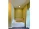 Relaxing bathroom featuring a built-in garden tub at 104 Richmar Ave, Haines City, FL 33844