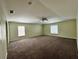 Large bedroom with ceiling fan and carpeted flooring at 104 Richmar Ave, Haines City, FL 33844
