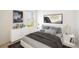 Modern bedroom with gray bedding and ample storage at 1145 Brimstone Cir, Winter Haven, FL 33884