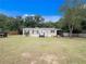 Single-wide manufactured home with large yard at 22545 Orange Blossom Ln, Eustis, FL 32736