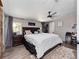Spacious bedroom with king-size bed and ample natural light at 22545 Orange Blossom Ln, Eustis, FL 32736