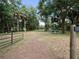 Spacious backyard with a gated entrance at 22545 Orange Blossom Ln, Eustis, FL 32736