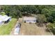 Aerial view of property showing home, shed, and large backyard at 22545 Orange Blossom Ln, Eustis, FL 32736