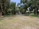 Large backyard with swings and plenty of space at 22545 Orange Blossom Ln, Eustis, FL 32736