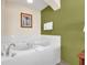 Relax in this large bathroom featuring a luxurious jetted tub at 8112 Poinciana Blvd # 1305, Orlando, FL 32821