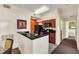 Open kitchen features a breakfast bar and granite countertops at 8112 Poinciana Blvd # 1305, Orlando, FL 32821