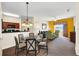 Bright and airy living room with comfortable seating and access to balcony at 8112 Poinciana Blvd # 1305, Orlando, FL 32821