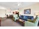 Open living space with dining area and comfortable seating at 8112 Poinciana Blvd # 1305, Orlando, FL 32821