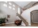 Elegant entryway with a staircase, tiled floor, and large windows at 4783 Cains Wren Trl, Sanford, FL 32771