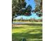 Scenic view of a golf course and pond at 34 Saint Andrews Ct, Kissimmee, FL 34759