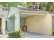 Covered carport with space for one vehicle and extra storage at 34 Saint Andrews Ct, Kissimmee, FL 34759
