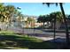 Well-maintained tennis court with surrounding fence at 4642 Commander Dr # 933, Orlando, FL 32822