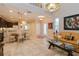 Kitchen and dining area with a glass table and four chairs at 5388 Via Appia Way, Sanford, FL 32771