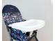 A Cosco high chair with a floral pattern and white tray at 7184 Oakmoss Loop, Davenport, FL 33837