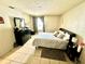 Main bedroom with dresser and window at 3970 Versailles Dr # 3970B, Orlando, FL 32808