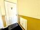 Interior condo entryway with a door and welcome mat at 3970 Versailles Dr # 3970B, Orlando, FL 32808