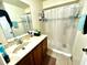 Clean bathroom with shower and vanity at 3970 Versailles Dr # 3970B, Orlando, FL 32808