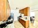 Bright kitchen with ample cabinetry and tile flooring at 3970 Versailles Dr # 3970B, Orlando, FL 32808