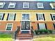 Exterior view of a two-story building with a central entrance at 3970 Versailles Dr # 3970B, Orlando, FL 32808