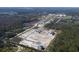 Aerial view of community with houses, roads, and open green spaces at 2522 Cedar Shake Ct, Oviedo, FL 32765