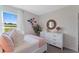 Bright bedroom with white dresser and pink bedding at 5417 Hayloft Dr, Apopka, FL 32712