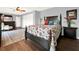 Charming bedroom with a queen-size bed and floral bedding at 102 Via Duomo, New Smyrna Beach, FL 32169