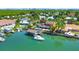 Stunning waterfront property with private dock and lush landscaping at 102 Via Duomo, New Smyrna Beach, FL 32169