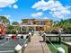 Walkway to the private dock, offering stunning water views at 102 Via Duomo, New Smyrna Beach, FL 32169