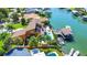 Waterfront property featuring a large home and private dock at 102 Via Duomo, New Smyrna Beach, FL 32169