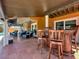 Outdoor patio with wet bar and comfortable seating at 102 Via Duomo, New Smyrna Beach, FL 32169