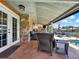 Relaxing covered patio overlooking the canal at 102 Via Duomo, New Smyrna Beach, FL 32169