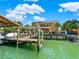 Waterfront home with private dock and boat lift at 102 Via Duomo, New Smyrna Beach, FL 32169