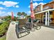 Enjoy the sun on comfortable lounge chairs by the pool at 102 Via Duomo, New Smyrna Beach, FL 32169