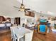 Open concept dining room and living area with hardwood floors at 102 Via Duomo, New Smyrna Beach, FL 32169
