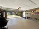 Large garage with open view to backyard and extra storage at 102 Via Duomo, New Smyrna Beach, FL 32169