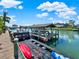 Private dock with covered boat lift and ample space at 102 Via Duomo, New Smyrna Beach, FL 32169